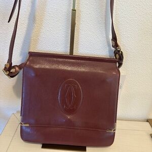Cartier red burgundy flab crossbody bag